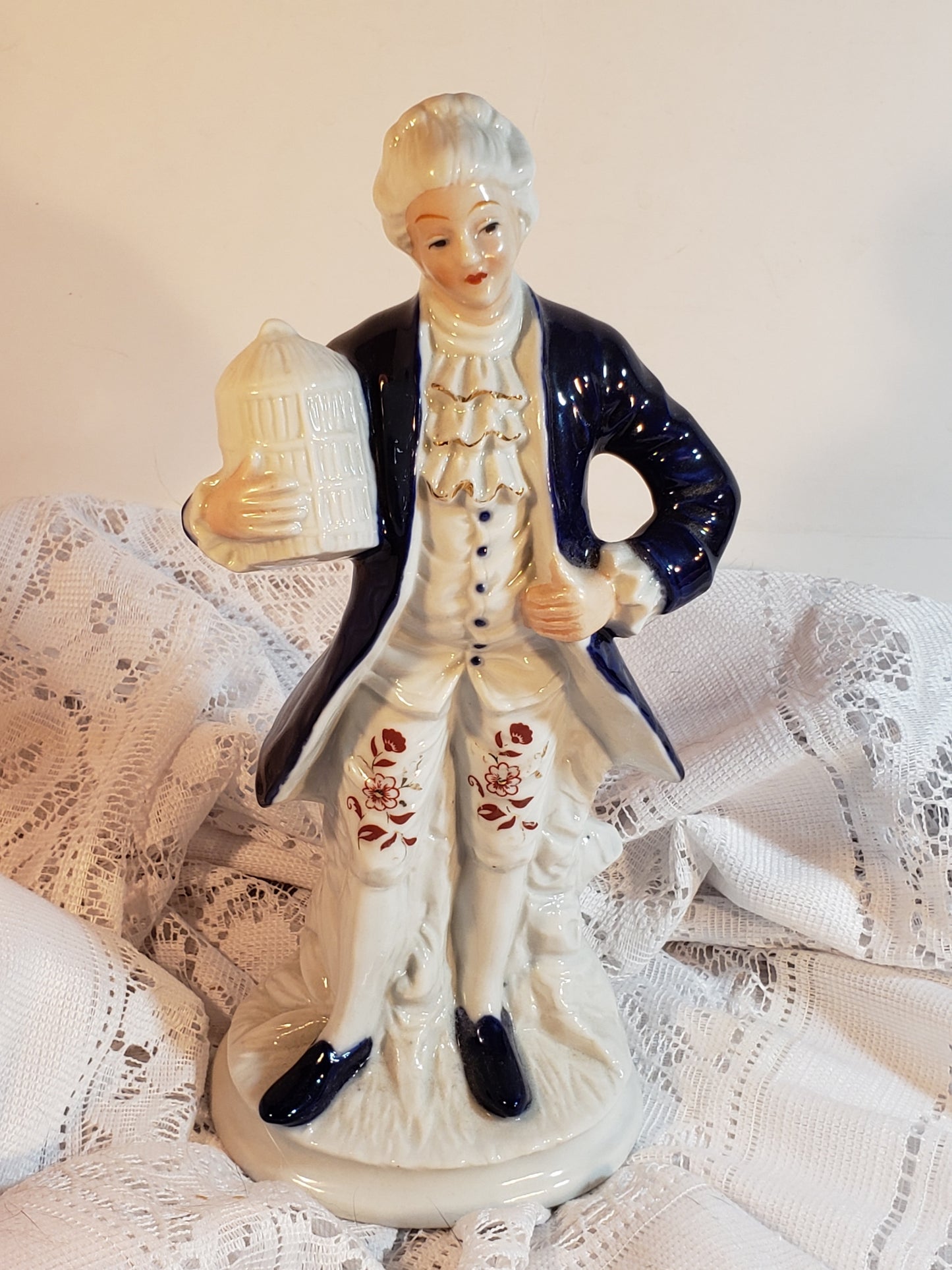 Colonial Man and Woman Figurines