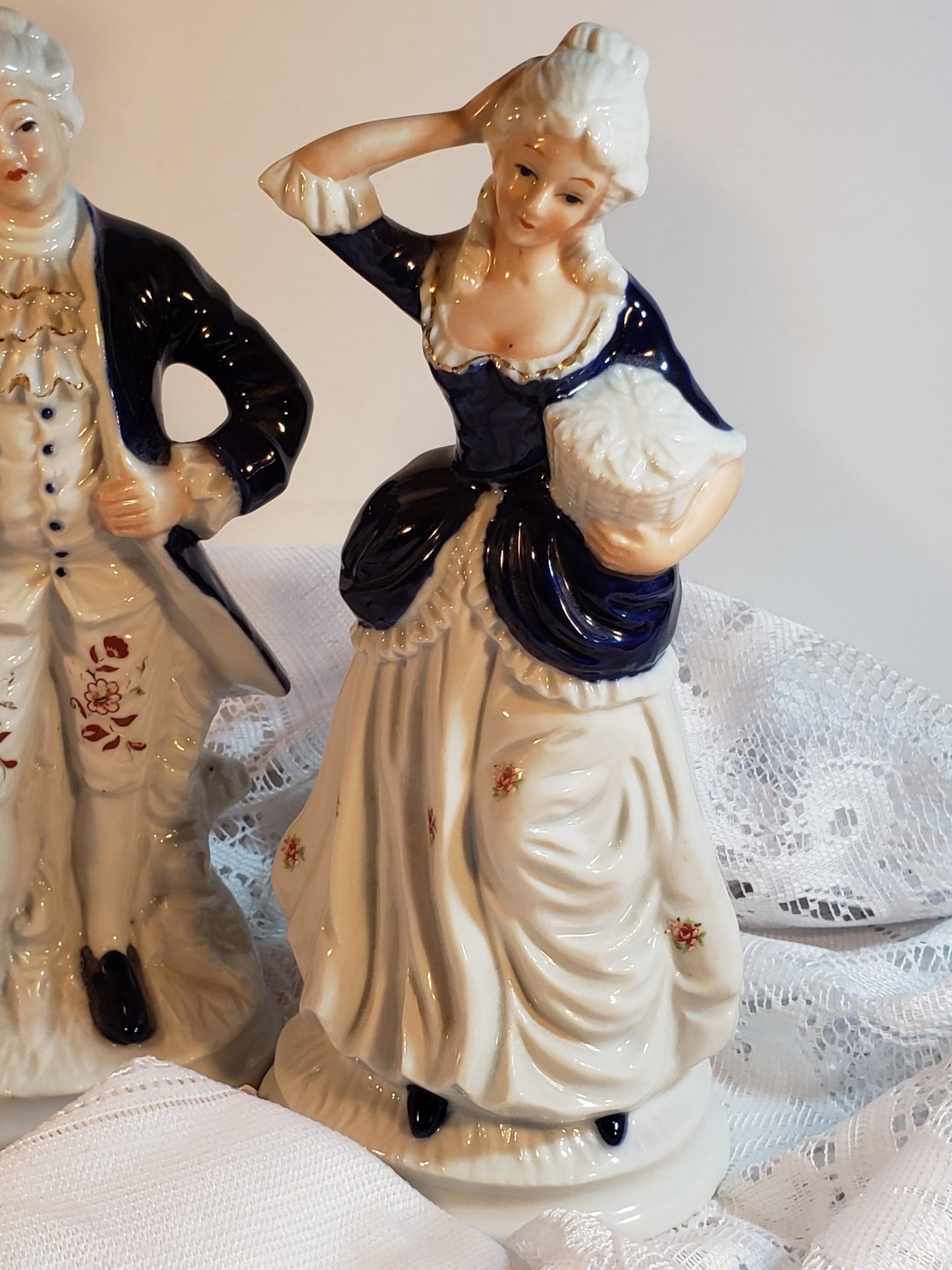 Colonial Man and Woman Figurines