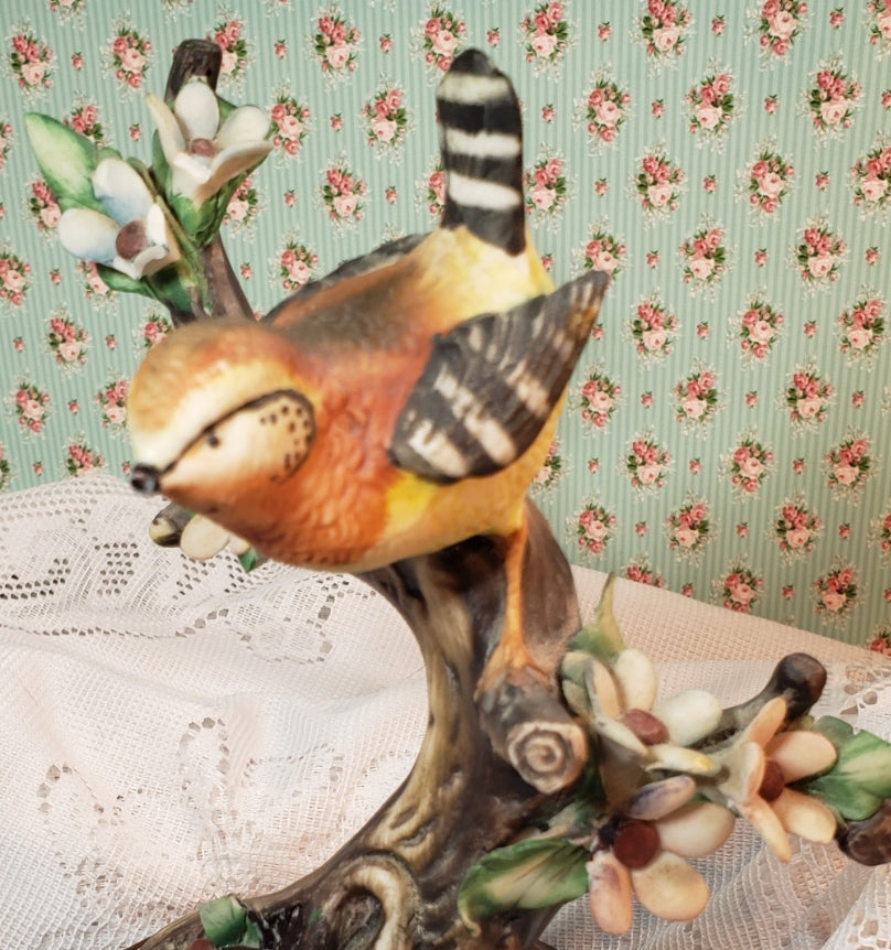 Bird on a limb figurine