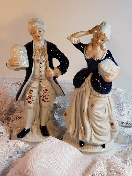 Colonial Man and Woman Figurines